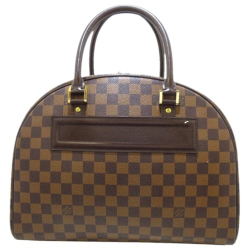 Pre-owned Louis Vuitton Nolita Handbag In Brown