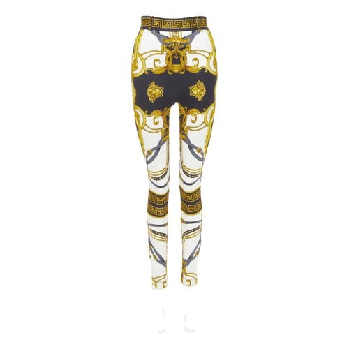 Pre-owned Versace Trousers In Gold