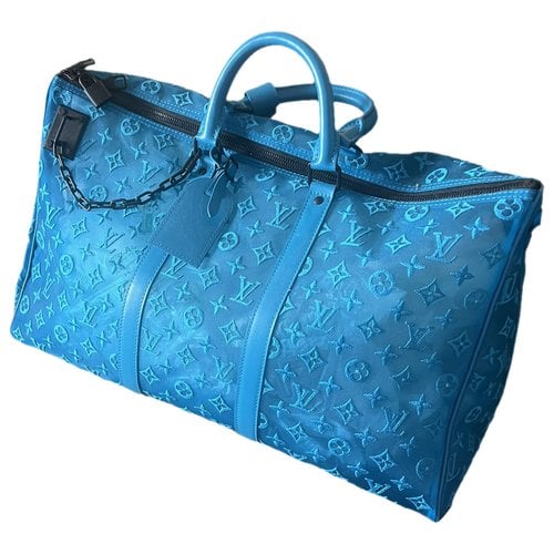 Pre-owned Louis Vuitton Keepall Triangle Cloth Weekend Bag In Blue