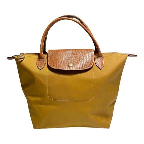 Pre-owned Longchamp Pliage Handbag In Brown