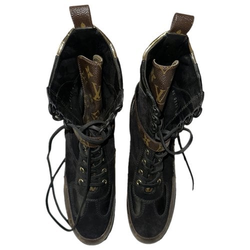Pre-owned Louis Vuitton Lauréate Leather Boots In Black