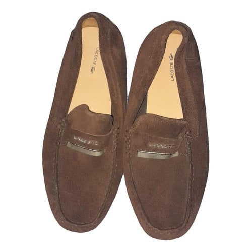 Pre-owned Lacoste Flats In Brown