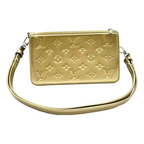 Pre-owned Louis Vuitton Lexington Leather Clutch Bag In Gold