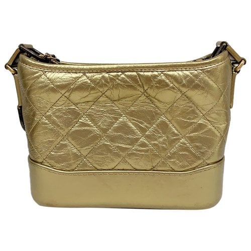 Pre-owned Chanel Gabrielle Leather Handbag In Gold