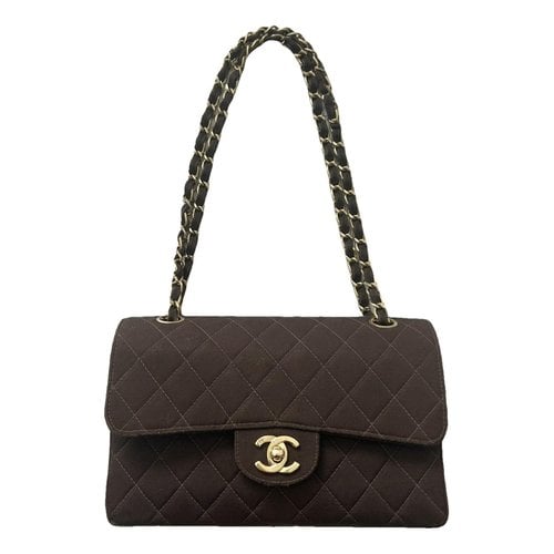 Pre-owned Chanel Timeless/classique Cloth Crossbody Bag In Brown