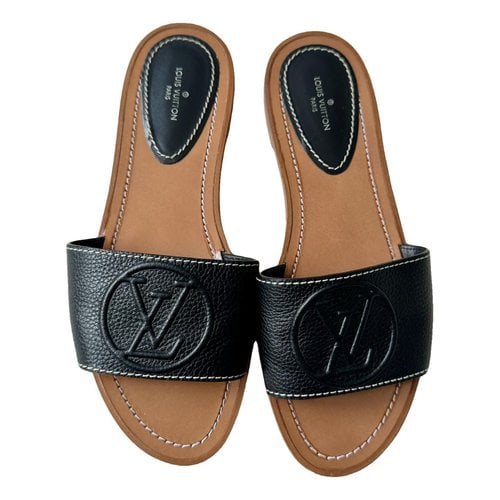 Pre-owned Louis Vuitton Lock It Leather Sandal In Black