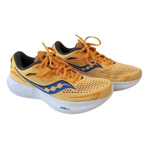 Pre-owned Saucony Trainers In Yellow