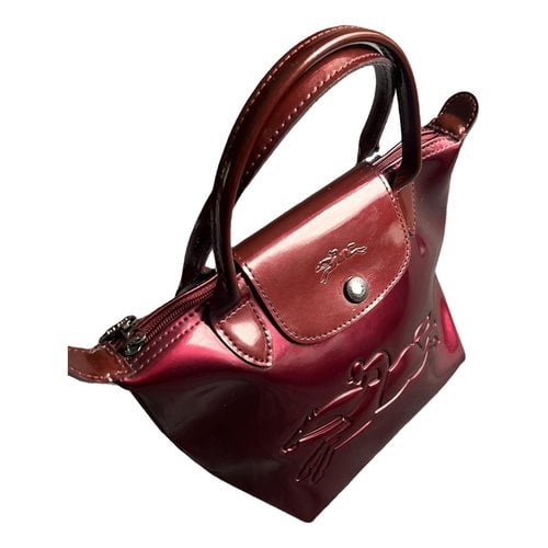 Pre-owned Longchamp Patent Leather Handbag In Burgundy