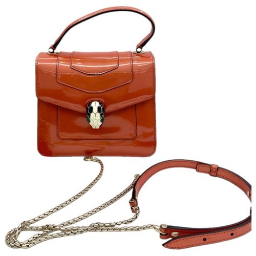Pre-owned Bvlgari Serpenti Patent Leather Handbag In Orange