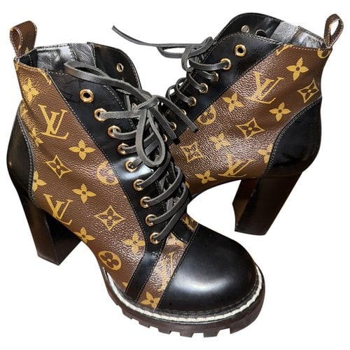 Pre-owned Louis Vuitton Lauréate Leather Boots In Black