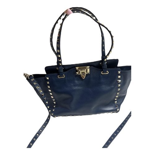 Pre-owned Valentino Garavani Rockstud Leather Clutch Bag In Blue