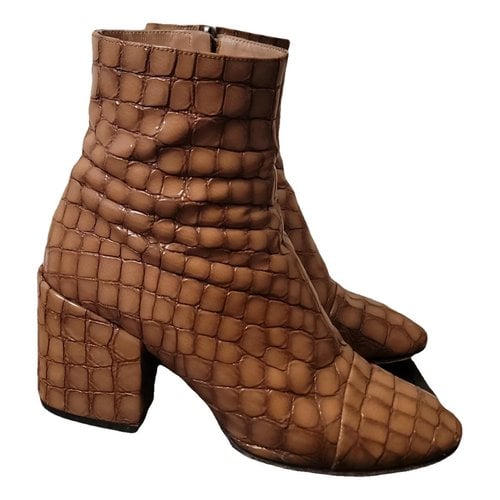 Pre-owned Dries Van Noten Patent Leather Boots In Brown