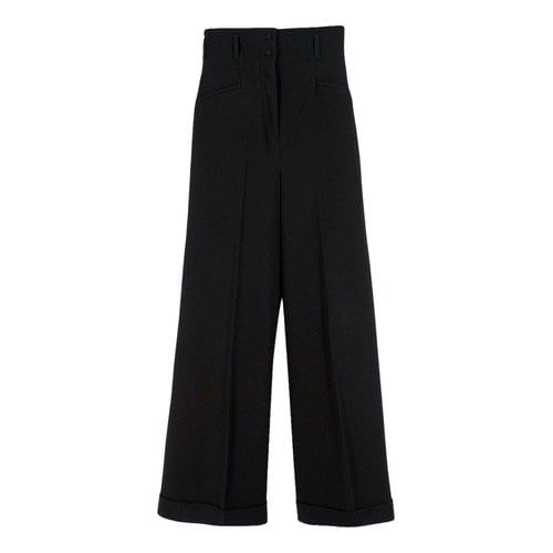 Pre-owned Racil Trousers In Black