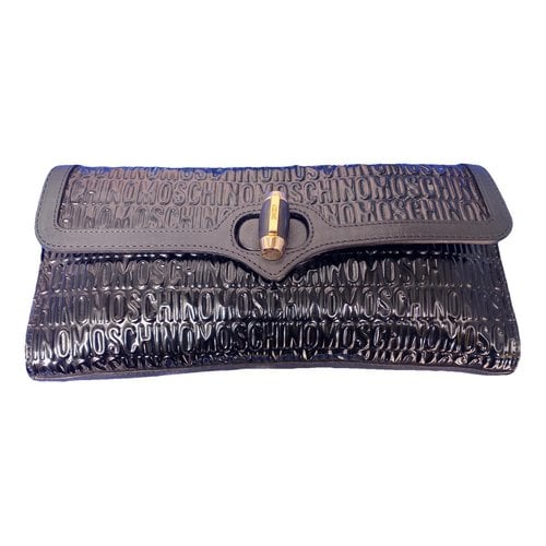 Pre-owned Moschino Patent Leather Clutch Bag In Black