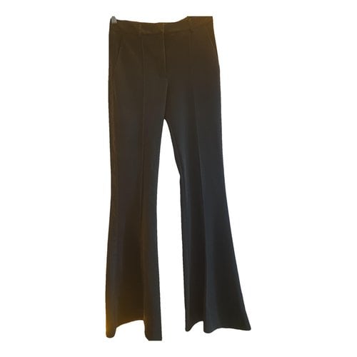 Pre-owned 8pm Trousers In Black