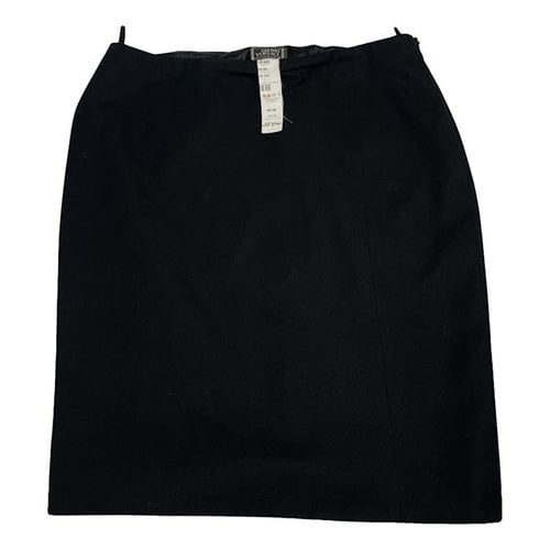 Pre-owned Versace Wool Mid-length Skirt In Black