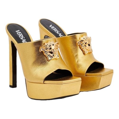 Pre-owned Versace Leather Mules & Clogs In Gold