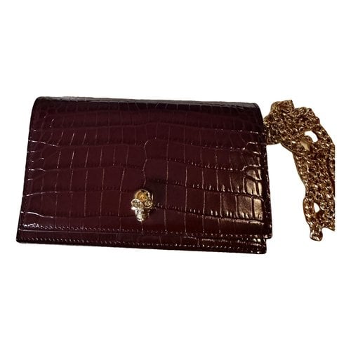 Pre-owned Alexander Mcqueen Skull Patent Leather Clutch Bag In Red