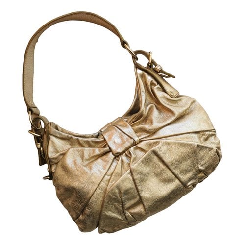 Pre-owned Saint Laurent Leather Handbag In Gold