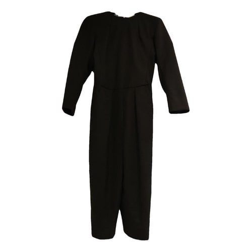 Pre-owned Saint Laurent Wool Jumpsuit In Black