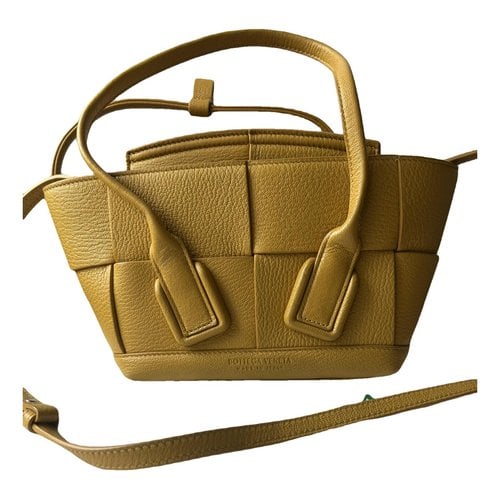 Pre-owned Bottega Veneta Arco Leather Crossbody Bag In Yellow