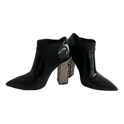 Pre-owned Pollini Patent Leather Boots In Black