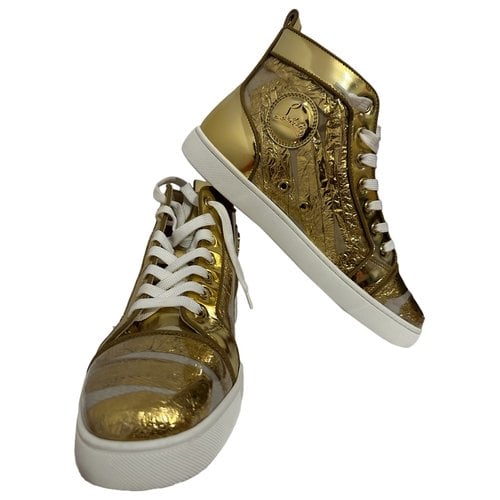 Pre-owned Christian Louboutin High Trainers In Gold