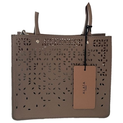Pre-owned Alaïa Leather Crossbody Bag In Beige