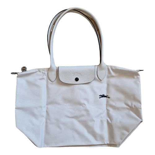 Pre-owned Longchamp Pliage Cloth Handbag In White