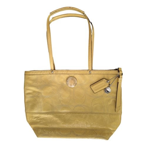 Pre-owned Coach City Zip Tote Patent Leather Handbag In Yellow