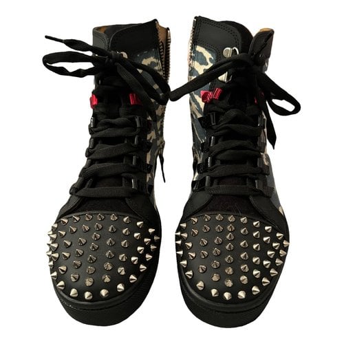 Pre-owned Christian Louboutin Vinyl Boots In Black