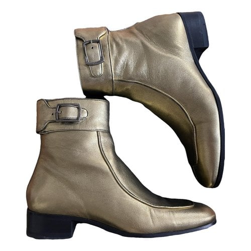 Pre-owned Saint Laurent Miles Leather Buckled Boots In Gold