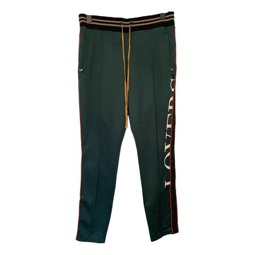Pre-owned Amiri Trousers In Green