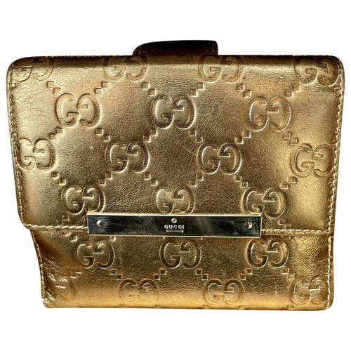 Pre-owned Gucci Patent Leather Wallet In Gold