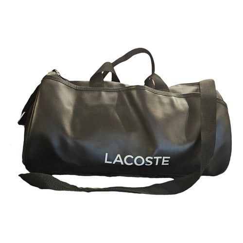 Pre-owned Lacoste Leather Travel Bag In Black