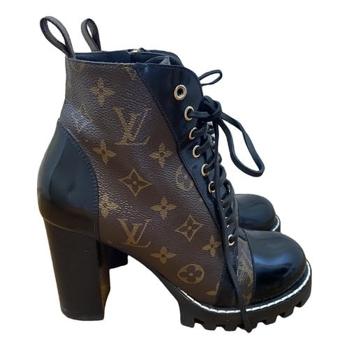 Pre-owned Louis Vuitton Vinyl Boots In Brown