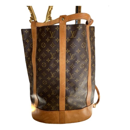 Pre-owned Louis Vuitton Randonnée Cloth Backpack In Brown