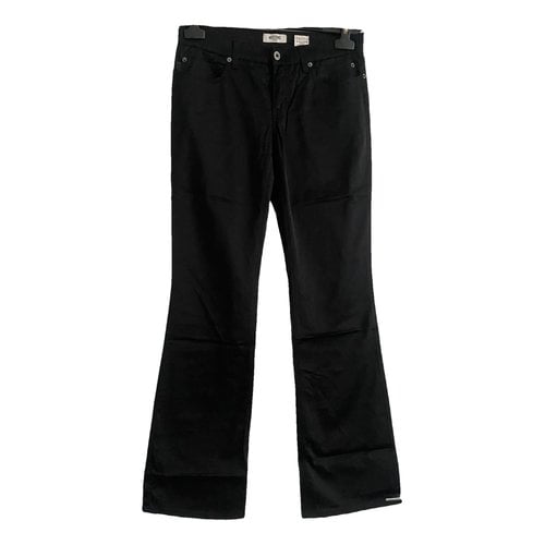 Pre-owned Moschino Bootcut Jeans In Black