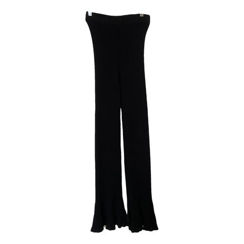 Pre-owned Ester Manas Trousers In Black