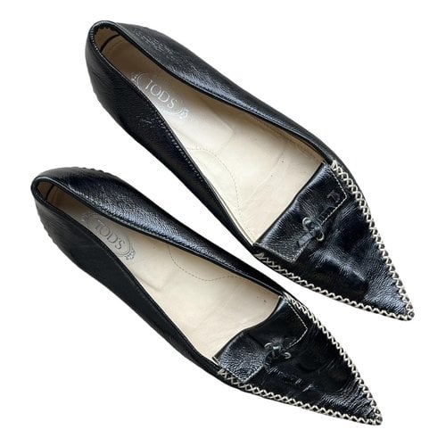 Pre-owned Tod's Pony-style Calfskin Ballet Flats In Black