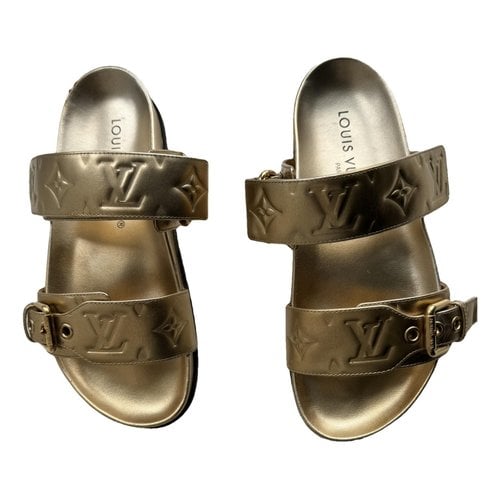 Pre-owned Louis Vuitton Leather Mules & Clogs In Gold