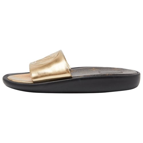 Pre-owned Louis Vuitton Leather Flats In Gold