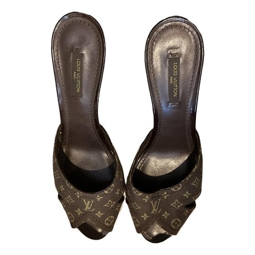 Pre-owned Louis Vuitton Cloth Mules & Clogs In Brown