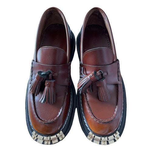 Pre-owned Sandro Leather Flats In Brown