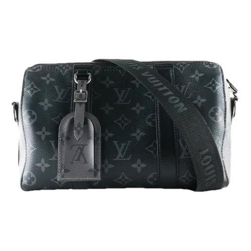 Pre-owned Louis Vuitton Keepall City Leather Satchel In Black