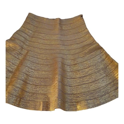 Pre-owned Herve Leger Mini Skirt In Gold