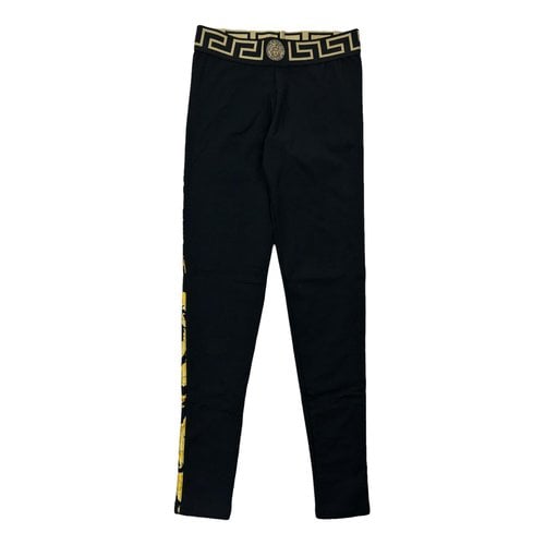 Pre-owned Versace Trousers In Black