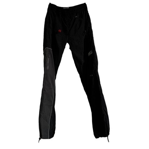 Pre-owned C2h4 Trousers In Black