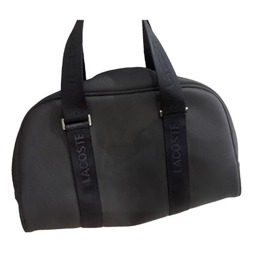 Pre-owned Lacoste Cloth Handbag In Black