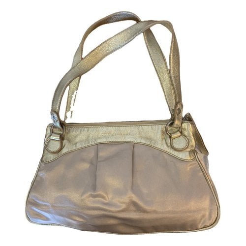 Pre-owned Coccinelle Leather Handbag In Gold